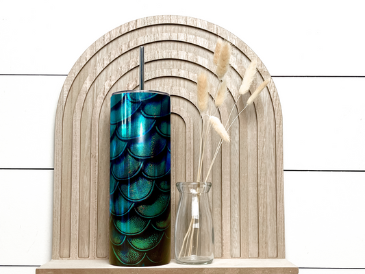 Teal metallic chrome base skinny tumbler with dragon scale print. 600ml double walled stainless steel skinny tumbler with leak proof lid and metal straw.